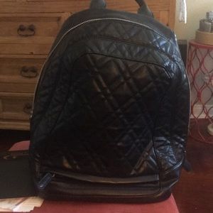 Black patterned vegan backpack